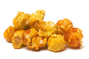 A pile of seasoned popcorn kernels.