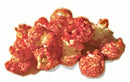 Cluster of spicy cheese popcorn on a white background