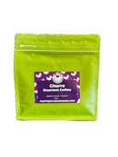 A vibrant lime green resealable bag of popped gourmet coffee churro with a purple label featuring sweet cinnamon churro magic