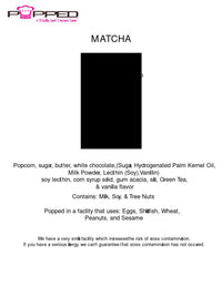 Matcha-flavored popcorn in a black rectangular package from popped, featuring ingredients like green tea and vanilla flavor.