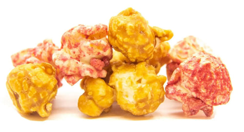 A pile of brightly colored, flavored popcorn kernels.