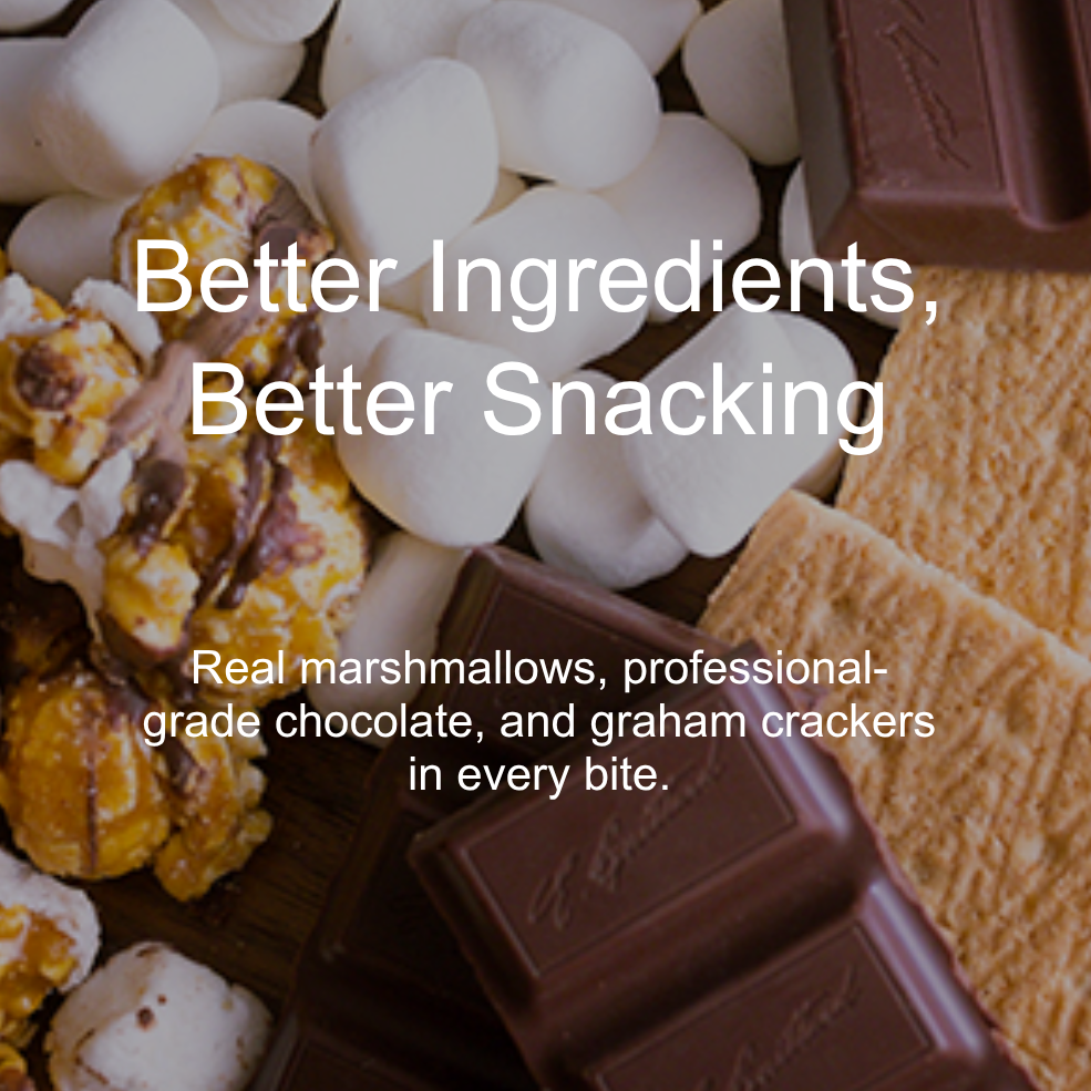 A close-up snack assortment photo with white marshmallows, dark chocolate bars, graham crackers, and popcorn on a wooden surface. Large overlaid text reads, 'Better Ingredients, Better Snacking' with smaller text below about real marshmallows, professional-grade chocolate, and graham crackers.