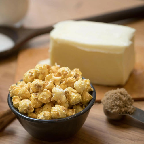 A bowl of caramel-coated popcorn.
