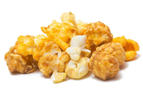 A pile of mixed gourmet popcorn, featuring caramel, cheese, and plain varieties.