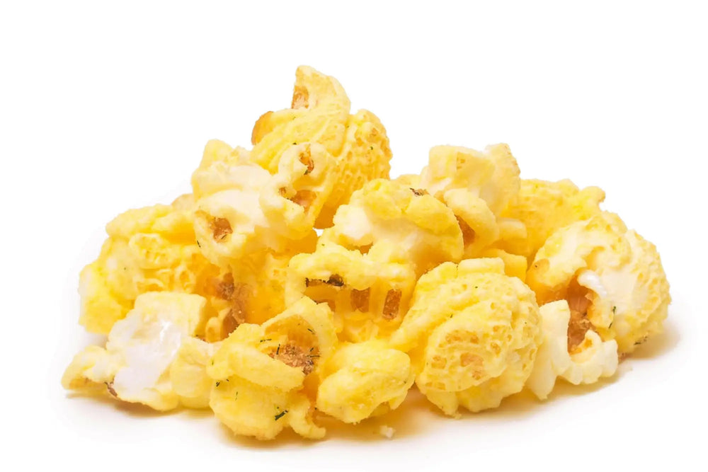 A pile of fluffy, yellow, seasoned popcorn kernels.
