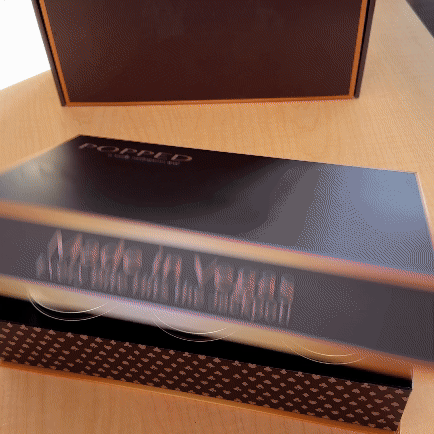 Black leather ’popped’ clutch bag with gold hardware and embossed logo.