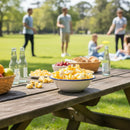 White ceramic bowl with a blue rim filled with yellow popcorn.