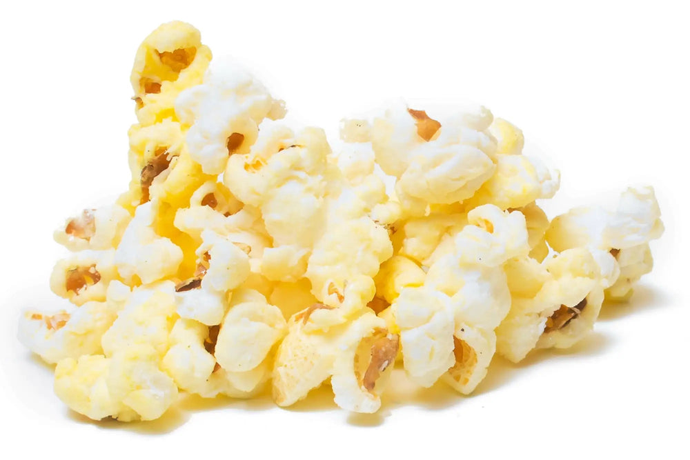 A pile of light yellow and white popcorn with some visible kernels.