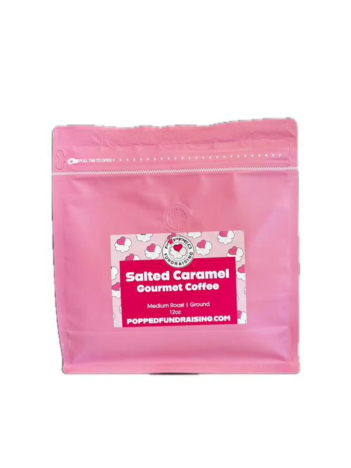 Pink resealable pouch of popped gourmet coffee salted caramel with red label and heart patterned border
