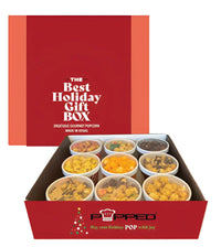Red holiday gift box with gourmet popcorn and 'Popped' branding.