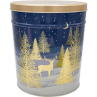 A round blue tin with a gold lid, featuring a winter scene with golden trees and a deer.