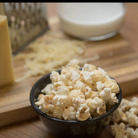 white cheddar popcorn in a bowl 